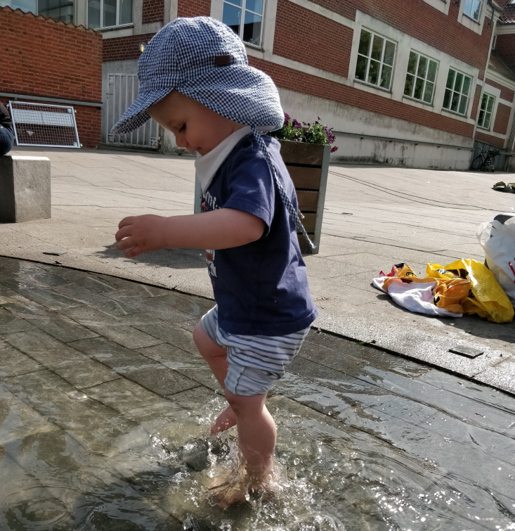 Splashing in puddles in the sun
